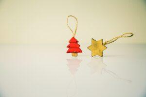 image of a red christmas tree decoration and a gold star of David decoration