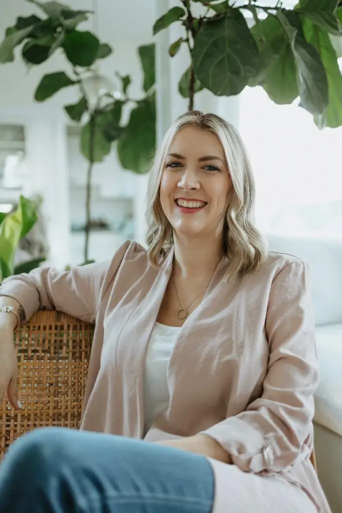 image of Ashley Greensmyth sitting on a chair