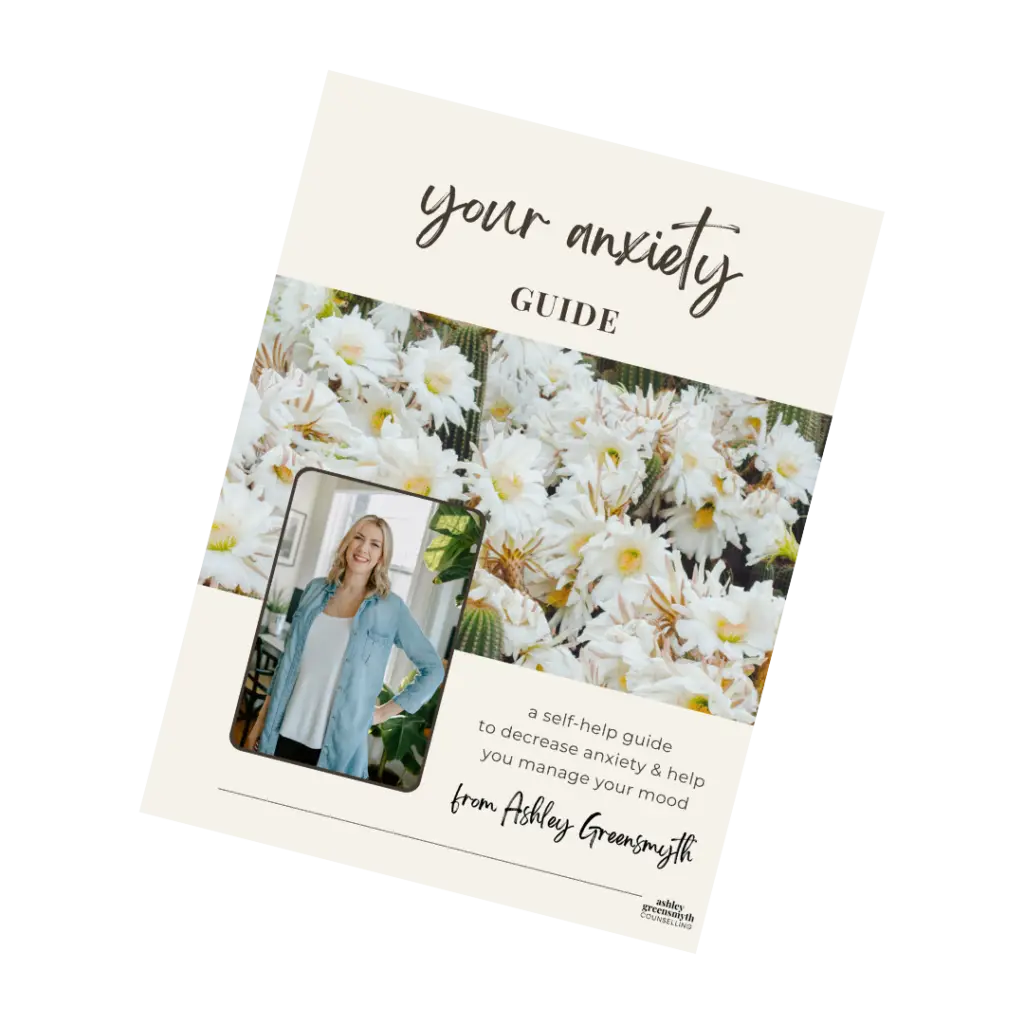 Image with caption "your anxiety guide" and subtext "a self-help guide to decrease anxiety & help you manage your mood" by Ashley Greensmyth